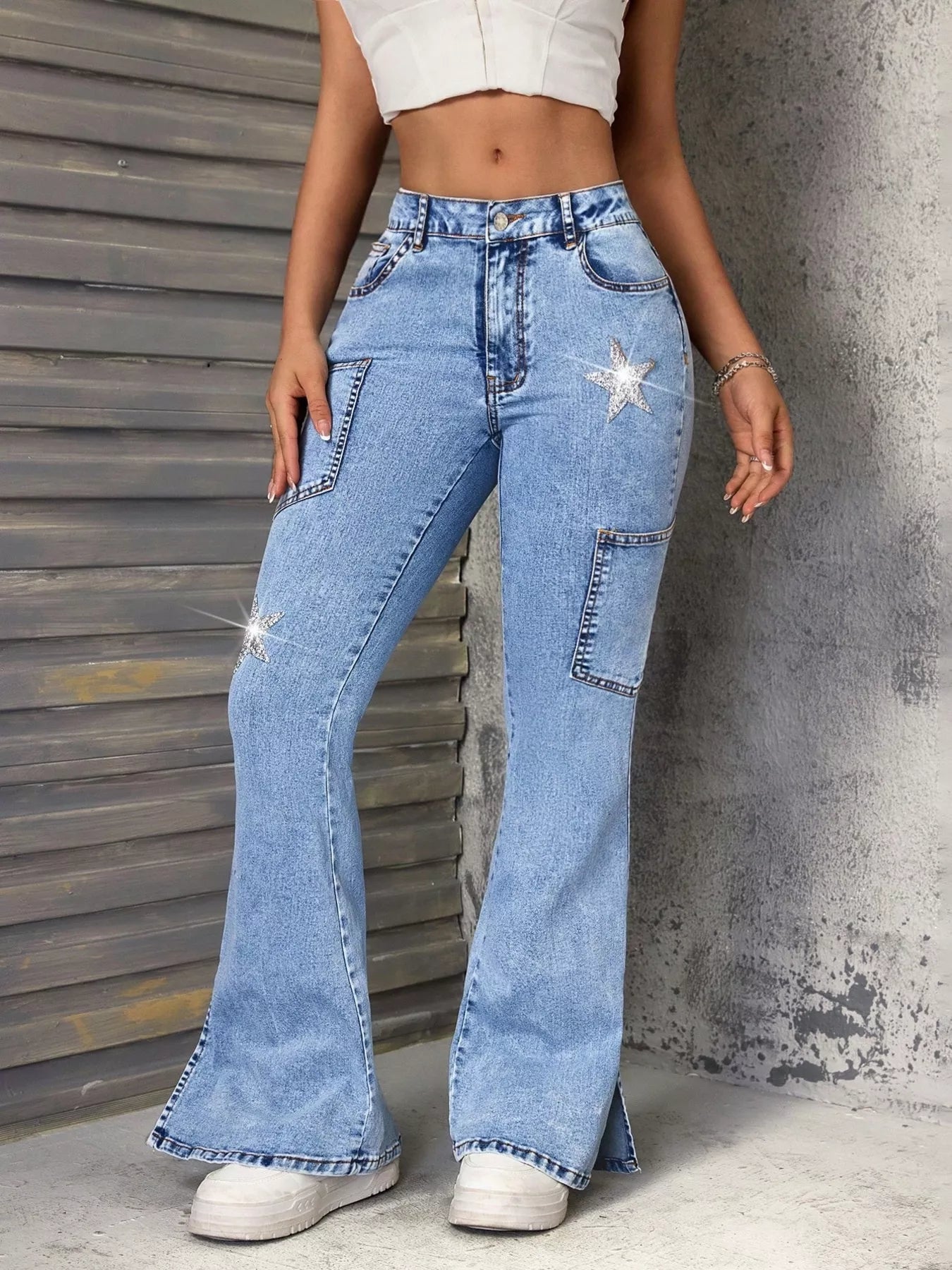Women’s slit flare leg jeans with front pockets, slightly stretchy denim, and inclusive sizing from S to XL”