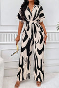 “Women’s V-neck short sleeve wide-leg jumpsuit in opaque polyester, available in US sizes 4 to 16”
