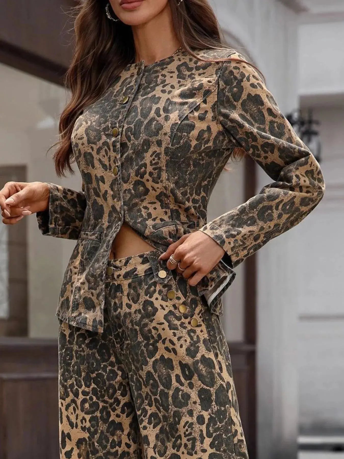 person wearing a leopard print outfit in an indoor setting