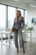 “Women’s washed denim two-piece set with buttoned top and wide-leg pants, available in sizes S to XL”