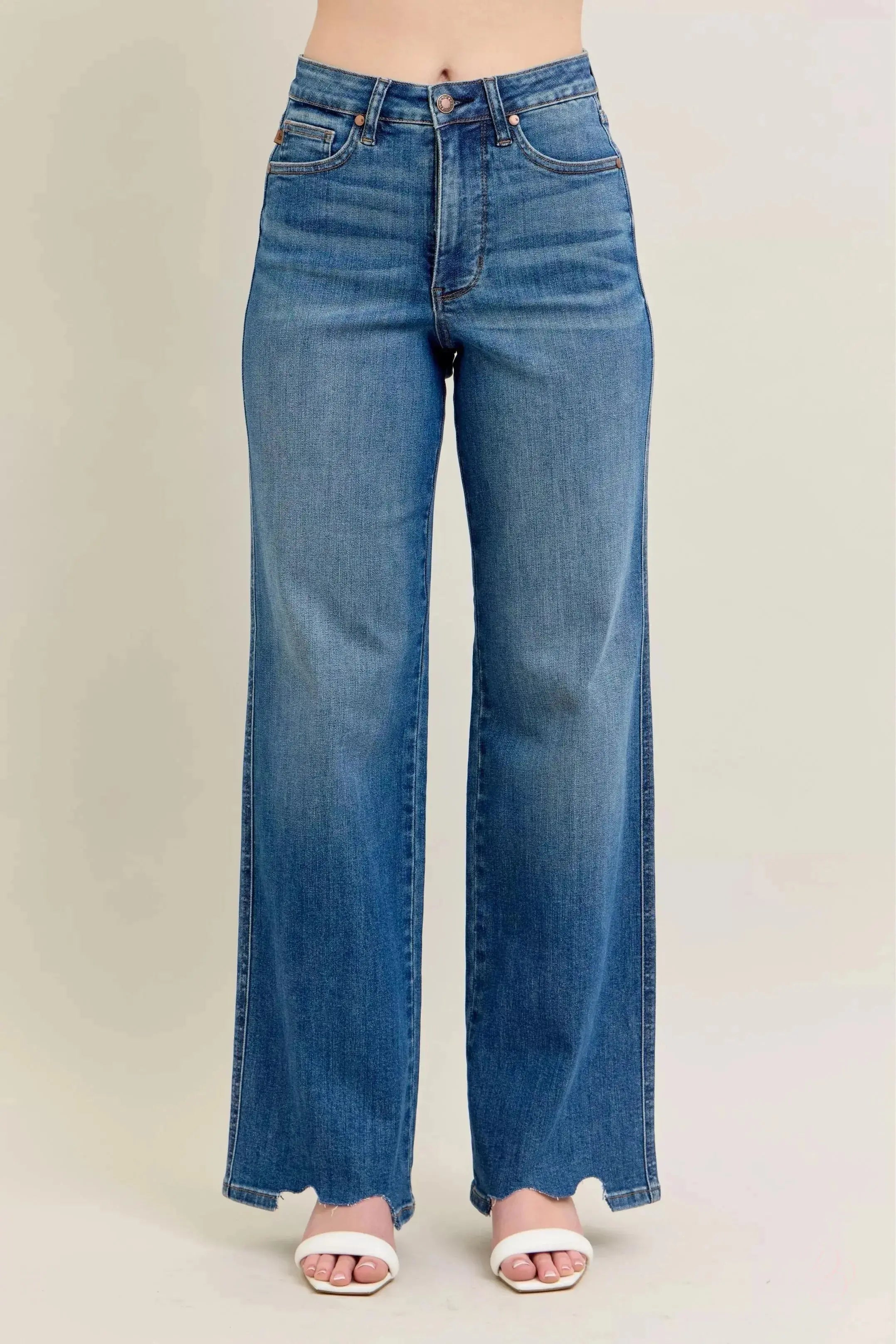 Blue jeans on a plain background
