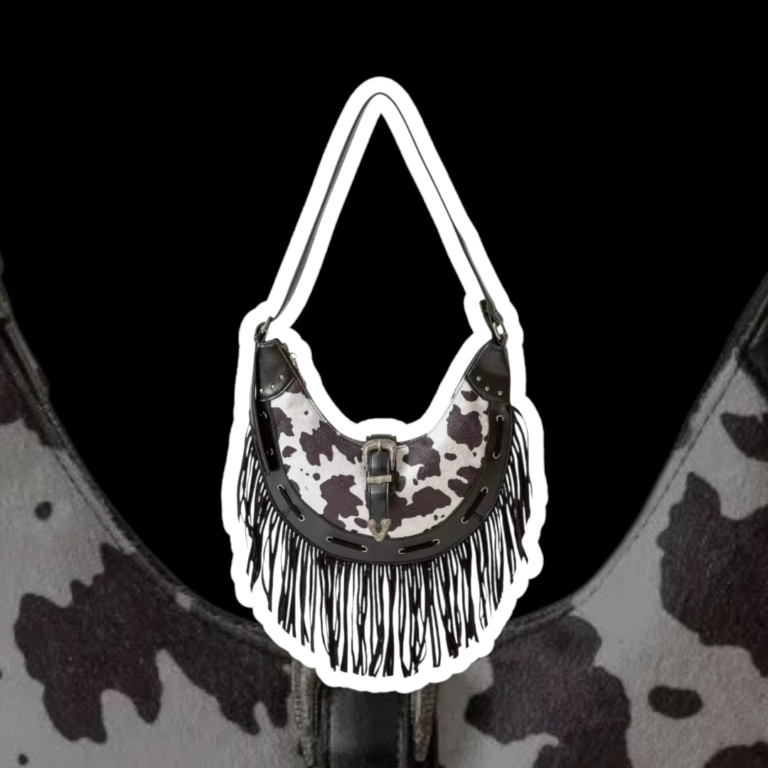 Fame Cow Print Faux Leather Fringe Hobo Bag