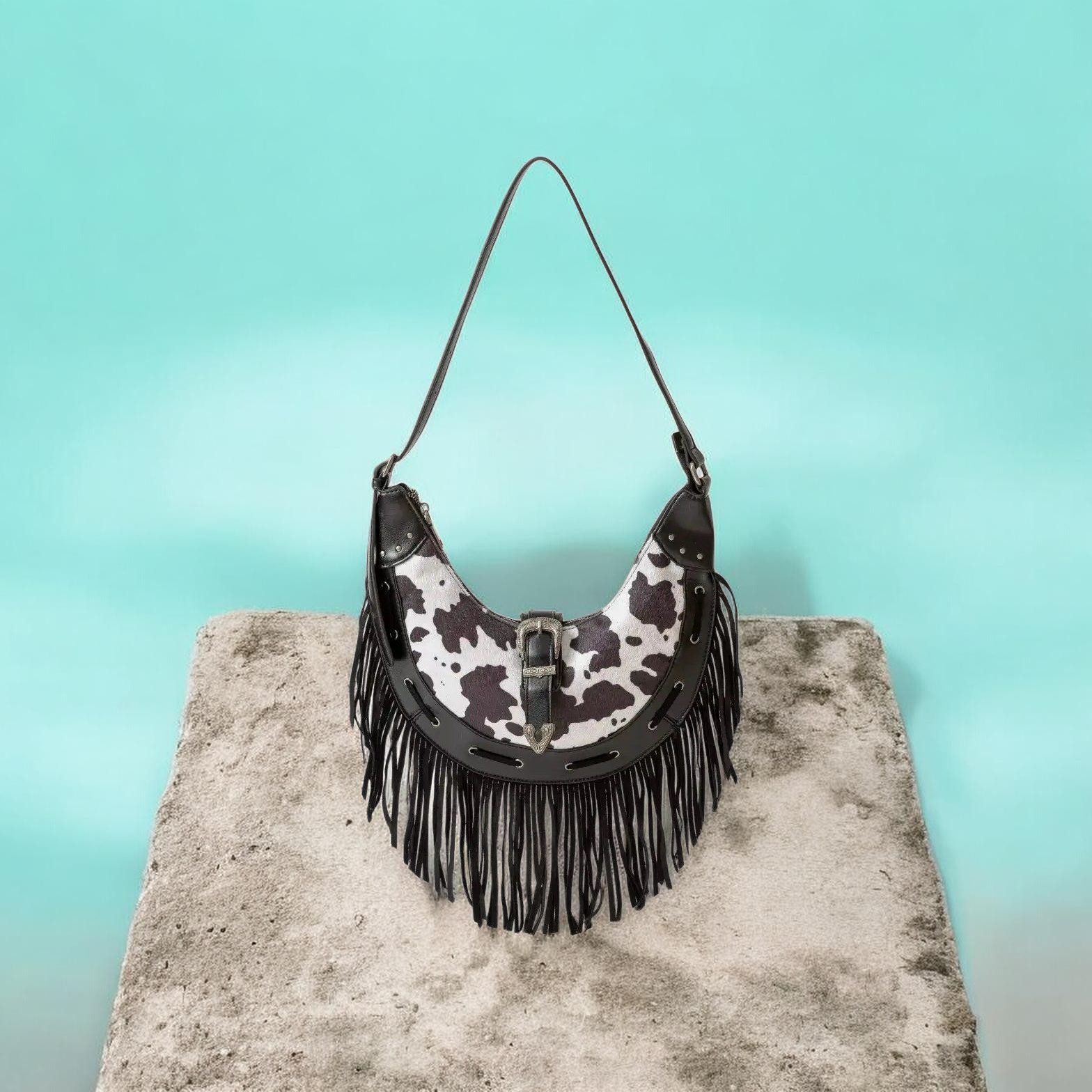 Fame Cow Print Faux Leather Fringe Hobo Bag